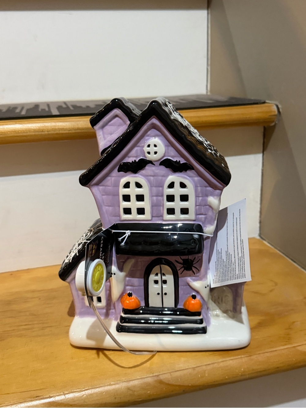 Aldi Finds Ceramic Purple Halloween Haunted House With LED Lights.